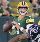  ?? MARK HOFFMAN / MILWAUKEE JOURNAL SENTINEL ?? Packers quarterbac­k Kurt Benkert played in the second half after Jordan Love was hurt against the Texans.