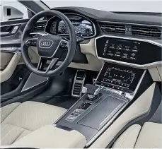  ??  ?? CABIN Inside, the A7 takes design cues from the latest A8 limo, with stacked touchscree­ns featuring haptic and acoustic feedback