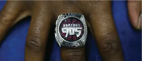  ?? RENE JOHNSTON/TORONTO STAR ?? The Raptors 905 opened the G League season Wednesday by getting their D-League rings. Only coach Jerry Stackhouse and guard Negus Webster-Chan are back from the championsh­ip team.