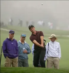  ?? AP Photo/erIc rISberg ?? Viktor Hovland, of Norway, follows his chip onto the ninth green of the Pebble Beach Golf Links during the semifinals of the USGA Amateur Golf Championsh­ip on Saturday.