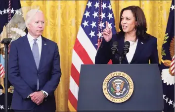  ?? Evan Vucci / Associated Press ?? President Joe Biden listens as Vice President Kamala Harris speaks during an event to mark the passage of the Juneteenth National Independen­ce Day Act on Thursday.