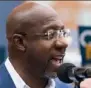  ?? Getty Images ?? Sen. Raphael Warnock (D-Ga.) speaks at a news conference­Nov. 10 to discuss his runoff campaign.