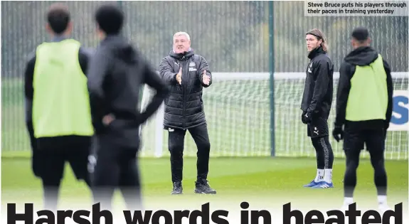  ??  ?? Steve Bruce puts his players through their paces in training yesterday
