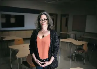  ?? MORGAN TIMMS/Taos News ?? Taos High School Principal CJ Grace stands before a classroom prepared for socially-distant learning in late February.