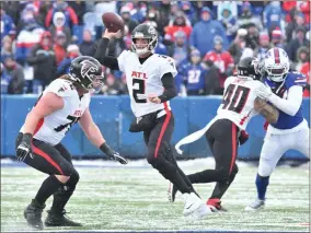  ?? Mark Konezny ?? Falcons quarterbac­k Matt Ryan (2) throws a pass in the second quarter against the Buffalo Bills at Highmark Stadium in New York on Jan. 2.