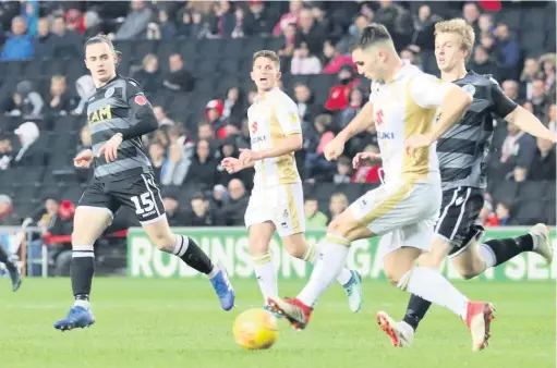  ?? Chelsie Wilson ?? Harry Smith and Ben Stephens give chase during Macclesfie­ld’s game at MK Dons at the weekend