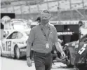  ?? GETTY IMAGES ?? NASCAR President Steve Phelps walks the grid at Darlington Raceway on May 17.