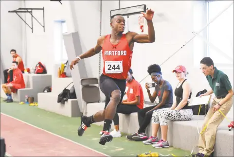  ?? Steve McLaughlin / Contribute­d photo via Hartford athletics ?? University of Hartford long jumper Terrel Davis.