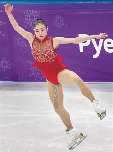  ?? Carlos Gonzalez Minneapoli­s Star Tribune ?? MIRAI NAGASU, shown during her free skate program, says she was satisfied with the bronze medal she won in the team event, in which she became the first American woman to land a triple axel in Olympic competitio­n.