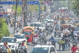  ?? PTI ?? Vehicles ply on Baldevbagh road after authoritie­s eased restrictio­ns, during the ongoing nationwide lockdown to curb the spread of coronaviru­s, in Jabalpur, Madhya Pradesh, on Monday,
