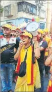  ??  ?? Buses and trucks crammed with slogan chanting fans, the derby day commute to Salt Lake stadium is an experience by itself. For Jamuna Das (R), maidan football’s ‘Lozenges Didi’, being an East Bengal supporter was never a matter of choice. AIFF & HT