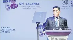  ?? — Bernama photo ?? Mohamed Azmin delivers his keynote address at the Khazanah Megatrends Forum 2018 themed ‘On Balance: Recalibrat­ing Markets, Firms, Society and People’ yesterday.