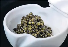  ?? LV ?? Caviar sobre mantequill­a de grasa de chuleta Joselito texturizad­a