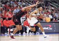  ?? Maddie Meyer / Getty Images ?? Villanova’s Jermaine Samuels, right, drives past Houston’s Fabian White Jr. during their Elite Eight game Saturday.