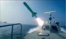  ?? Sepahnews via AP ?? A Revolution­ary Guard’s speed boat fires a missile during a military exercise July 28.