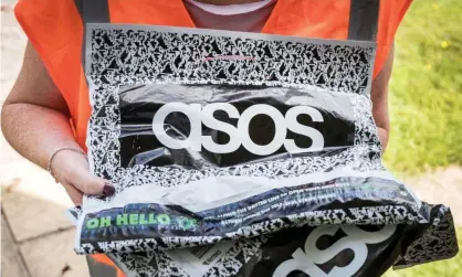  ?? Photograph: True Images/Alamy Stock Photo ?? ‘Products that were previously unaffordab­le to many are now placed tantalisin­gly within reach.’ A delivery from Asos, an online clothing company.