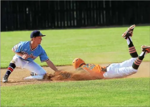  ?? GREGG SLABODA — TRENTONIAN PHOTO ?? Allentown’s Danny McCormick, left, tags out Bordentown’s Kyle Forcini at second base.