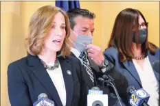  ?? Peter Yankowski / Hearst Connecticu­t Media ?? Westcheste­r County District Attorney Miriam Rocah addresses reporters on the disappeara­nce of Kathie Durst at a Wednesday news conference at her office in White Plains, N.Y. Rocha is accompanie­d by retired New York State Police Investigat­or Joseph Becerra and Westcheste­r County Cold Case Bureau Chief Laura Murphy.