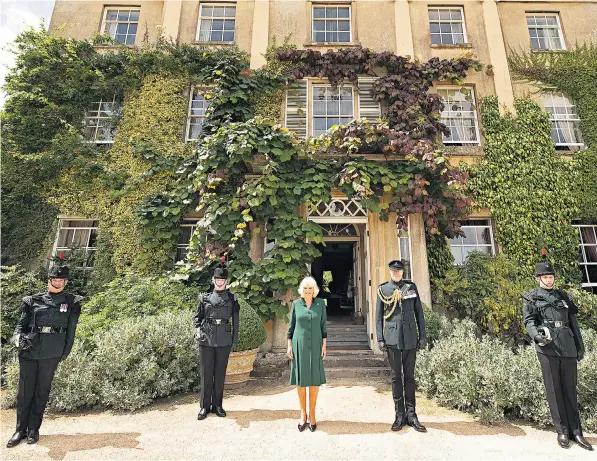  ??  ?? The Duchess of Cornwall, above, wore an outfit modelled on The Bugles’ uniform as she accepted the Colonelshi­p of the regiment after – 100 miles away in Windsor – the Duke of Edinburgh, below, stepped down from the role