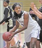  ??  ?? Valencia’s Chidinma Ikonte (33) pulls down a rebound against Knight defenders on Dec. 4 at Valencia High.