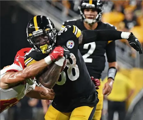  ?? Peter Diana/Post-Gazette photos ?? Jaylen Samuels carried four times for 26 yards and scored the Steelers first touchdown.