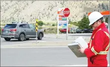  ?? RCMP/Special to The Herald ?? A member of RCMP South Okanagan Traffic Services dressed up as a constructi­on worker to look for unsuspecti­ng distracted drivers.