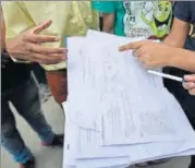  ?? SANCHIT KHANNA/HT PHOTO ?? Students outside Bhaiya’s coaching centre in Rajendra Nagar on Thursday.