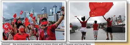  ?? ?? Support…the anniversar­y is marked in Hong Kong with Chinese and local flags