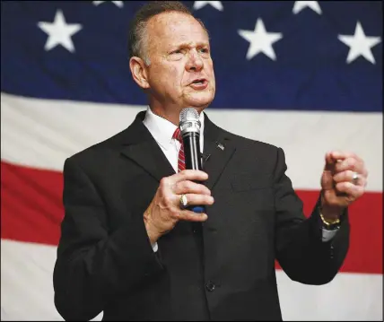  ?? Ap photo ?? Former Alabama Chief Justice and U.S. Senate candidate Roy Moore speaks at a campaign rally in Fairhope, Ala.