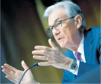  ?? Photo / AP ?? In the US, Federal Reserve chair Jerome Powell has finally admitted inflation is a ‘real threat’ to the economy.