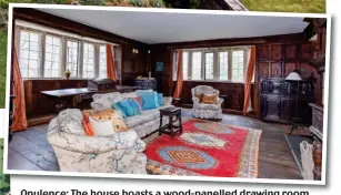  ?? ?? Opulence: The house boasts a wood-panelled drawing room