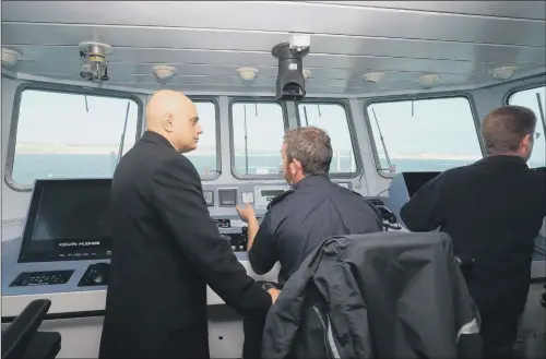  ?? PICTURE: PA. ?? TAKING CONTROL: Home Secretary Sajid Javid meets Border Force staff on board HMC Searcher who are patrolling the English Channel.