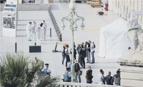  ?? PICTURE: GETTY IMAGES ?? 0 French police and forensics officers at the scene outside Saint-charles train station in Marseille