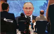  ?? ALEXANDER ZEMLIANICH­ENKO — THE ASSOCIATED PRESS ?? Russian President Vladimir Putin speaks via video call during a news conference in Moscow, Russia, on Thursday.