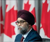  ?? CP FILE PHOTO ?? National Defence Minister Harjit Sajjan listens to a question during a news conference on June 26.