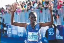  ?? Picture: MIKE BATTERHAM ?? Mercy Kibarus running in second place.