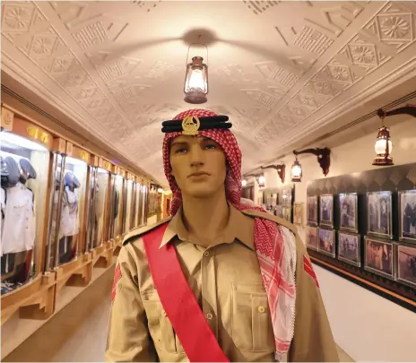  ?? Chris Whiteoak / The National ?? Clockwise from above: early police attire at the Dubai Police Museum; director of the museum, Lt Mansoor Al Mansoori; and early equipment used by Dubai Police