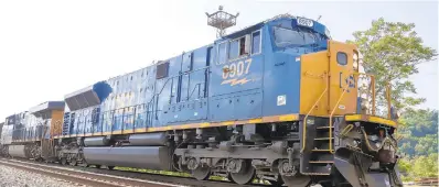  ?? GENEJ. PUSKAR|AP ?? A CSX freight train pulls through McKeesport, Pa., on June 2.