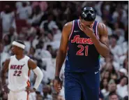  ?? WILFREDO LEE — THE ASSOCIATED PRESS ?? 76ers center Joel Embiid wipes his face during the second half of Game 5against the Heat on May 10in Miami.