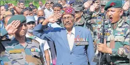  ??  ?? ■ Subedar Raj Singh (retd) paying tribute to his son havildar Jorabar Singh, who died in an encounter in Kupwara, at Rait village in Kangra on Friday. SHYAM SHARMA/HT