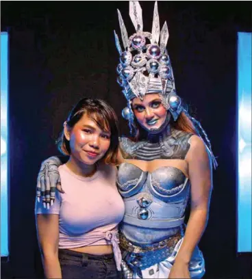  ?? COURTESY OF DILLON MORNINGSTA­R ?? Cambodian makeup artist Apple (left) with Charli Hueston as the ‘Apsara Robot’.