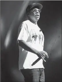  ??  ?? Jay-Z, shown performing at a New York music festival in September, leads all Grammy nomination­s this year with eight. The awards begin at 6:30 p.m. today on CBS.