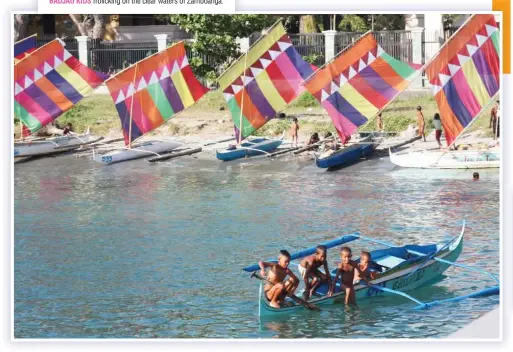  ??  ?? BADJAO KIDS frolicking on the clear waters of Zamboanga.