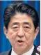  ??  ?? Abe: Boosts war gear to counter China