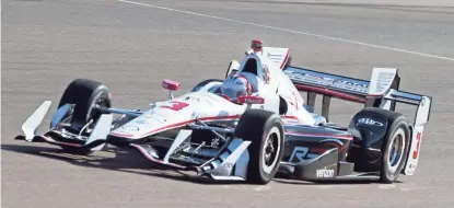  ?? BEN MOFFAT/AZCENTRAL SPORTS ?? Helio Castroneve­s drives during a practice run before the Desert Diamond West Valley Phoenix Grand Prix at Phoenix Internatio­nal Raceway in Avondale on Friday.