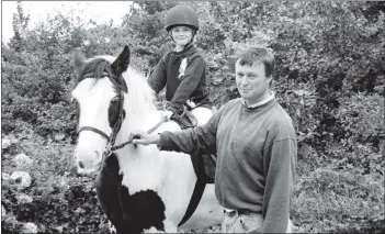  ?? 01_B37twe05 ?? Arran’s newest business venture, the Brodick Riding Centre, started this week with owner Gavin Bell taking his first pupil on a pony trekking adventure at the Bell family farm in Corriegill­s.