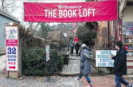  ?? PHOTOS: JONATHAN ELDERFIELD/THE ASSOCIATED PRESS ?? The Book Loft of German Village in Columbus, Ohio, which opened more than 40 years ago, features 150,000 individual titles and over 500,000 books in stock. The store brims with shoppers and is open seven days a week.