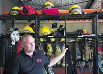  ?? SHAUGHN BUTTS ?? Slave Lake Fire Chief Jamie Coutts and two of his men drove the 430 kilometres from Slave Lake to Fort McMurray with extra equipment and immediatel­y charged to the front lines in Beacon Hill.