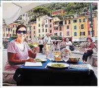  ??  ?? A lunch of trofiette pasta and Vermentino wine at Delfino, a restaurant in Portofino.