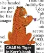  ??  ?? CHARM: Tiger in Kerr’s book